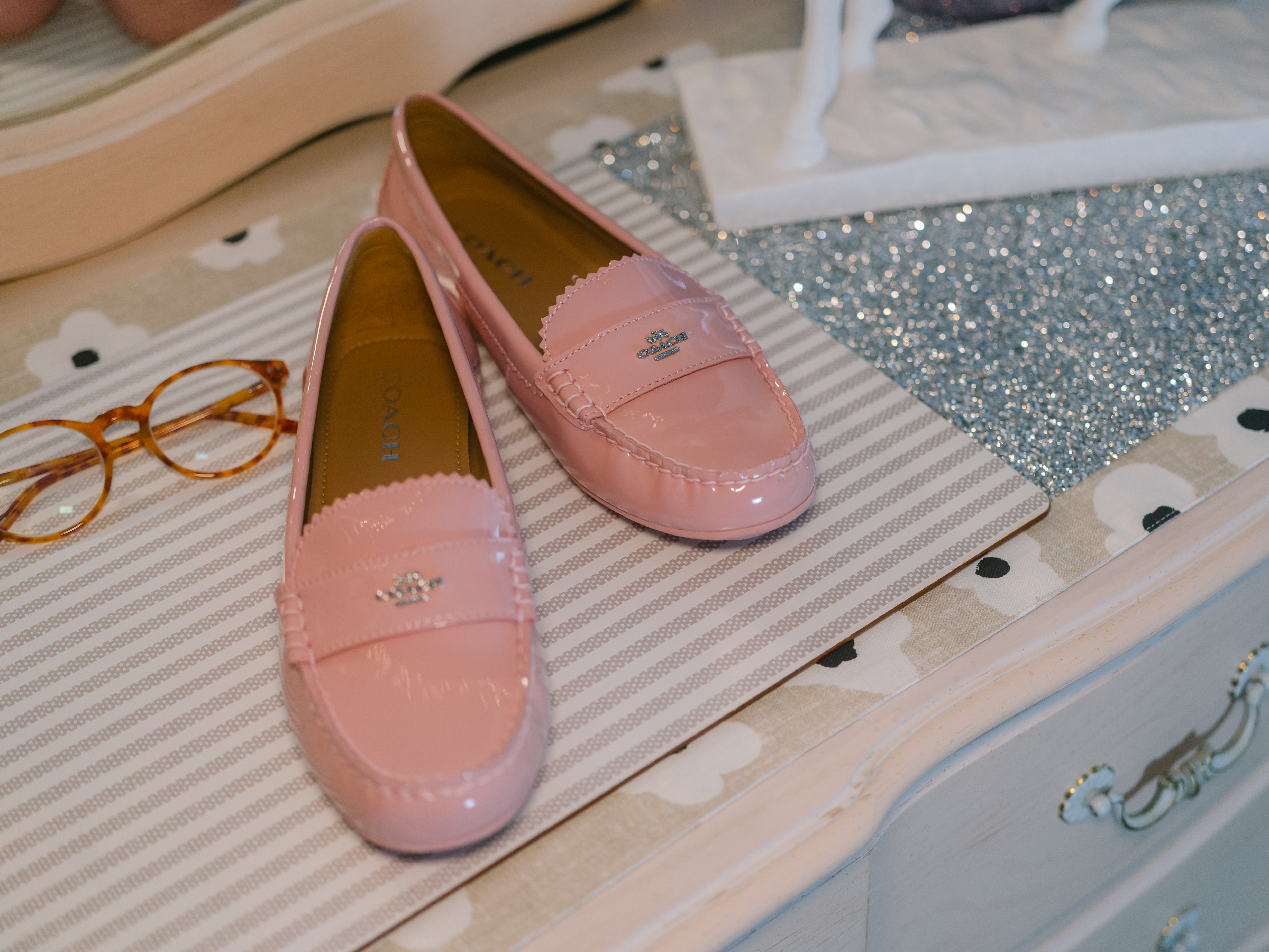 pink Coach loafers