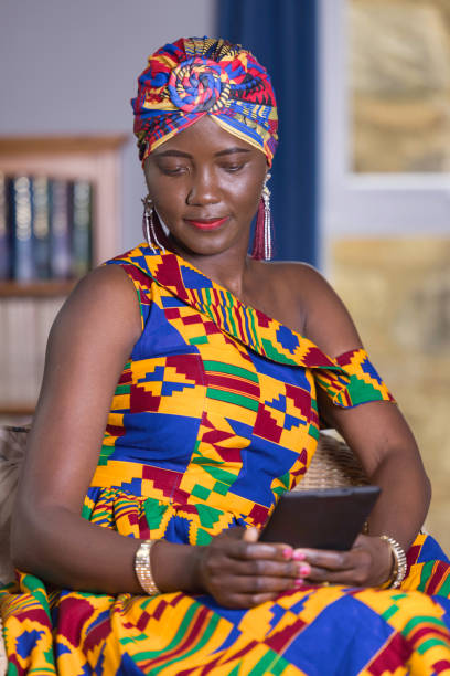 Ghanaian lady with authentic style in traditional dress and headdress