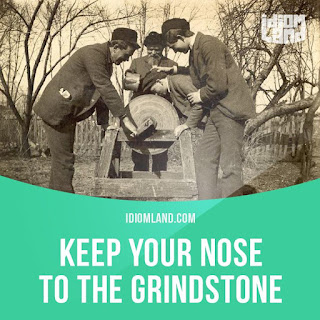 'keep your nose to the grindstone' with old time photo
