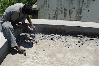 Installation of cool roof tiles on Terrace