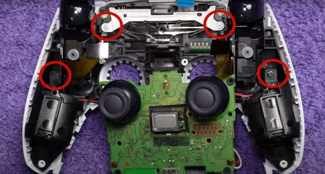 فك البراغي الداخلية لمقبض PS5