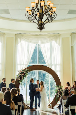 bride and groom at lake mary events center routunda