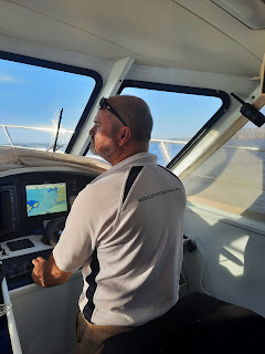 Master, skipper at helm