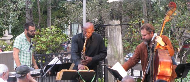 Jason Adasiewicz, vibraphone; David Boykin, saxophone; Joshua Abrams, double bass; and Frank Rosaly, drums; performing at the Museum of Contemporary Art's Tuesdays on the Terrace in Chicago, Illinois