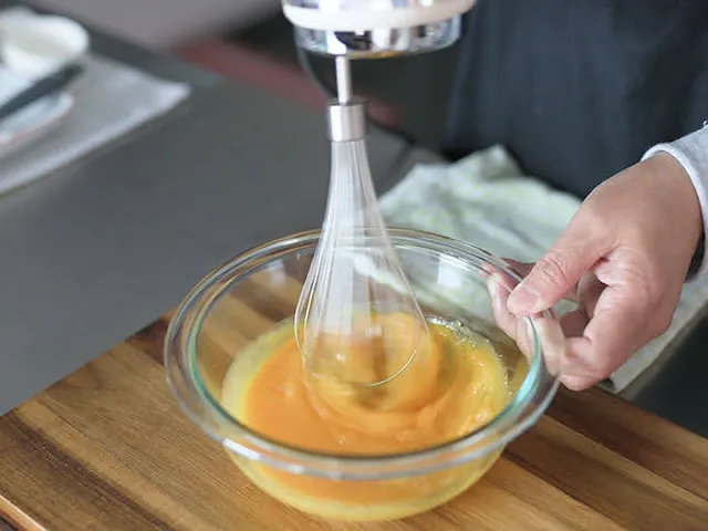 Whisk egg yolks with sugar until  creamy.