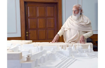 Prime Minister Narendra Modi with a model of the Kashi Vishwanath temple