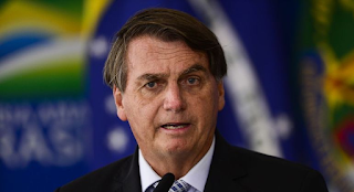Jair Bolsonaro chega ao Brasil
