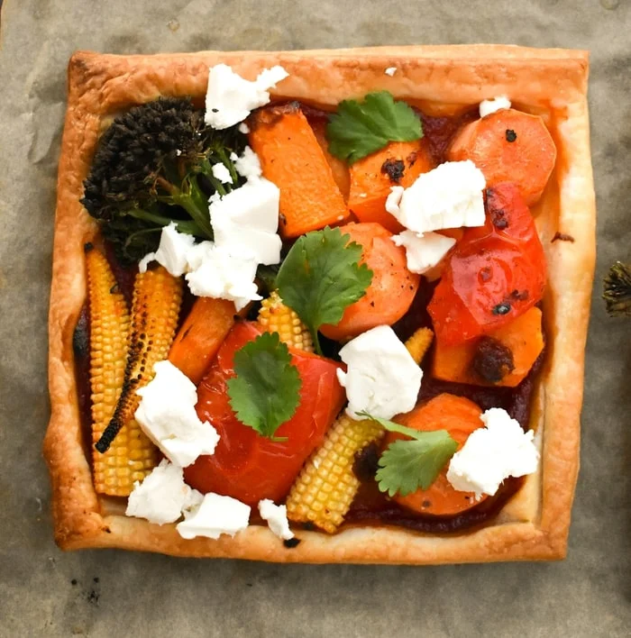 Individual vegetable pie topped with fresh herbs