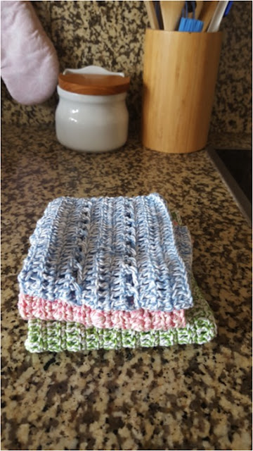 A trio of crochet kitchen towels