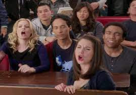 The characters from Community booing