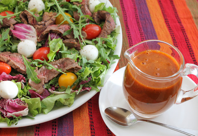 Food Lust People Love: This roasted tomato vinaigrette steak salad sees the vinaigrette do double duty, first as a marinade for the rump steak and then as dressing for the salad itself.