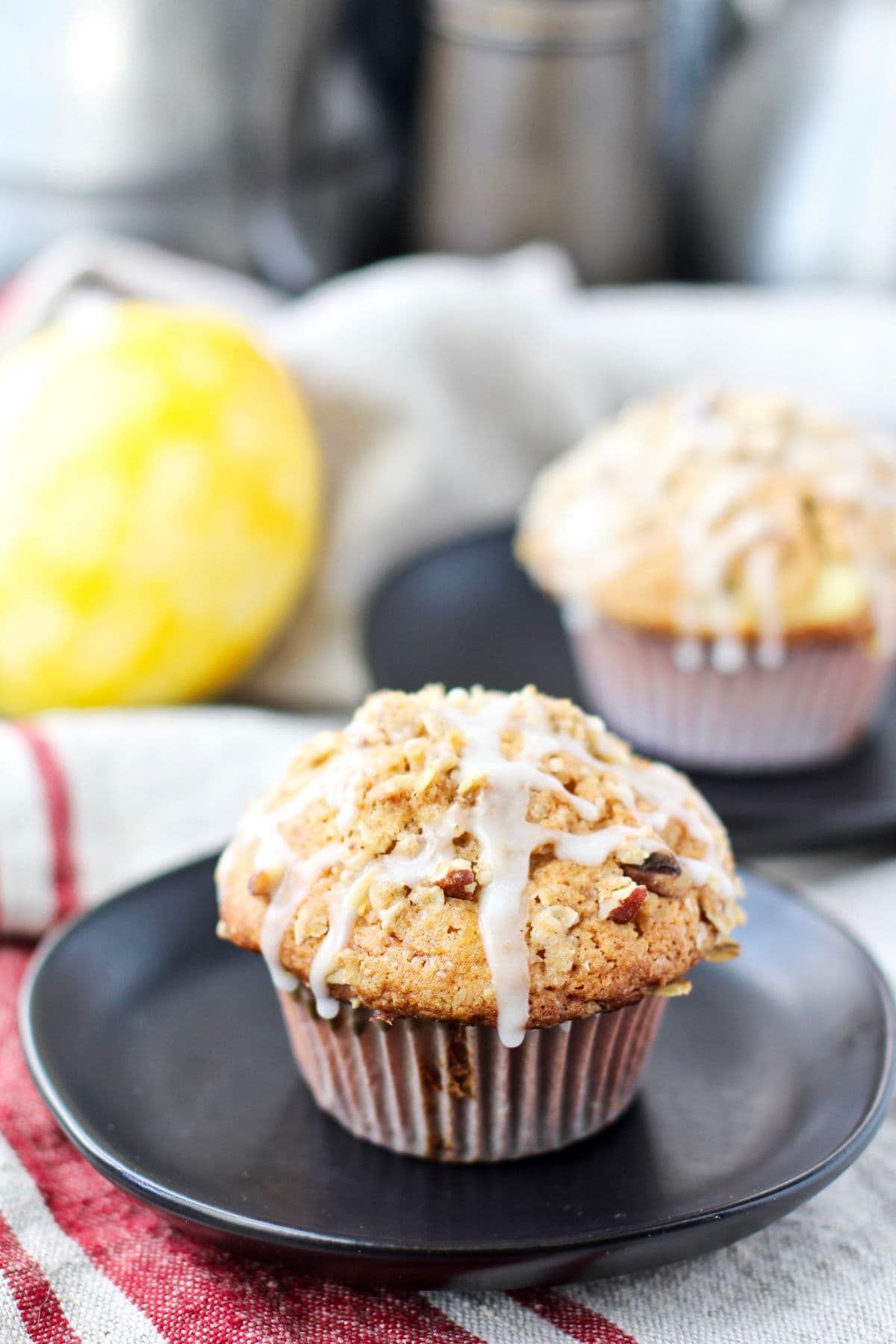 Lemon curd muffins with a glaze.