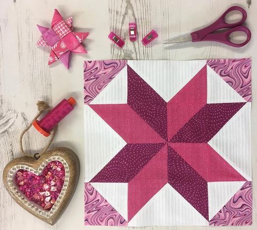 Windmill Quilt Block by Kim Monins, The Pattern designed by Amy Smart of Diary of a Quilter. it's available for free.