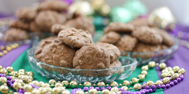 Food Lust People Love: Nothing says Mardi Gras party quite like the sweet chewy bite of pecan praline cookies! These bake up quick and easy, lighter than air, but with the rich taste of brown sugar and toasted pecans.