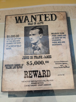 Interpretive signage at the park includes a reproduction of Jesse James' Wanted poster
