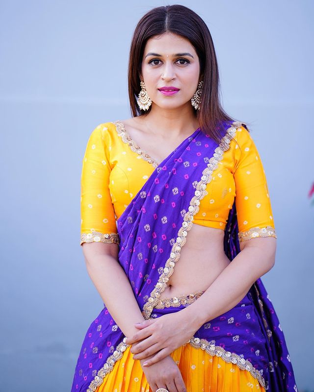 Shraddha Das Dazzles in the Radiant Blend of Purple and Yellow Half Saree