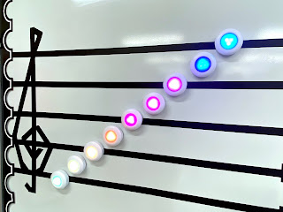 DIY Light Up Staff Board, treble clef display. Bright and fun way to learn treble clef lines and spaces names. Music teacher hack.