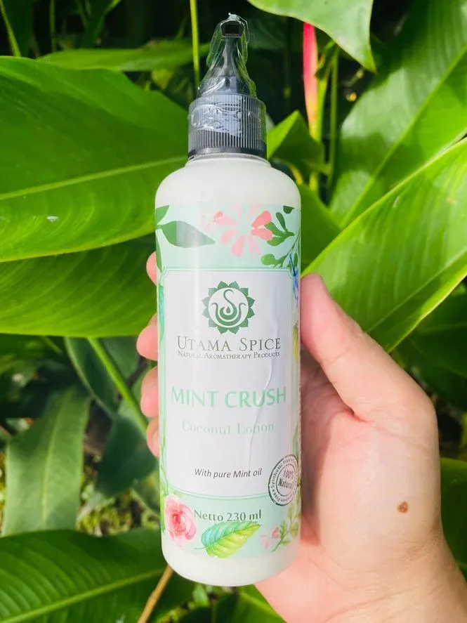 A bottle of Utama Spice Mint Crush Coconut Lotion