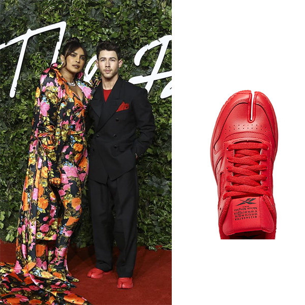 Nick Jonas wearing Maison Margiela Red classic Reebok Sneakers The Fashion Awards November 29, 2021.