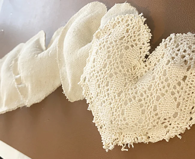 row of hearts with a lace heart