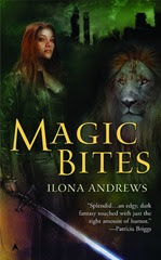 Magic Bites cover by Ilona Andrews. Deatures woman stood with sword and a lion in the background.
