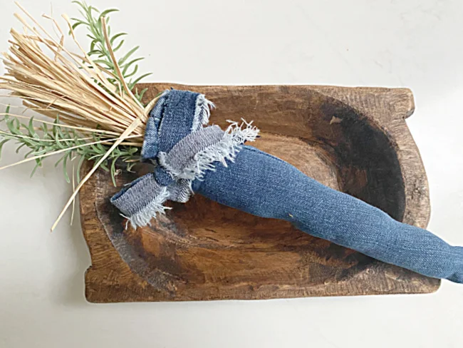 denim carrot in dough bowl