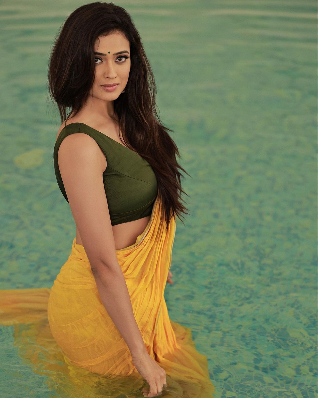 Shweta Tiwari flaunts her curves at 42 in a Yellow Saree and a Sleeveless Plunging Neckline Blouse (View Pics)