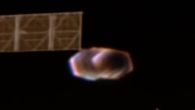 Hexagon shaped UFO with a Sphere in the middle of it tries to Dock with the ISS.