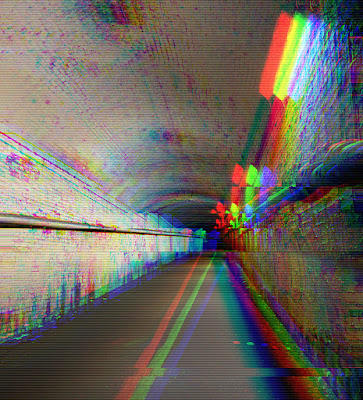 Distorted glitch image of a pedestrian tunnel