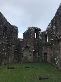 A photo showing the interior walls of the ruins of Morton Castle.  The floor of the castle is an area of cut grass.  Photograph by Kevin Nosferatu for the Skulferatu Project.