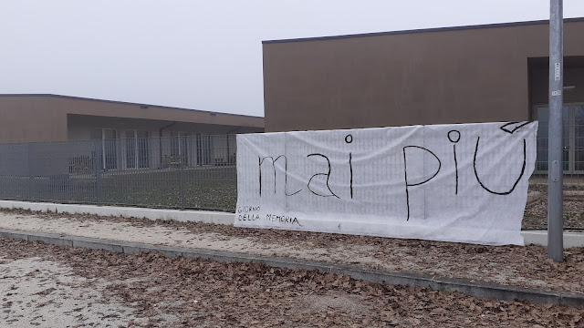 LE PAROLE ALL'INGRESSO DEL CAMPO DI DACHAU IN GERMANIA