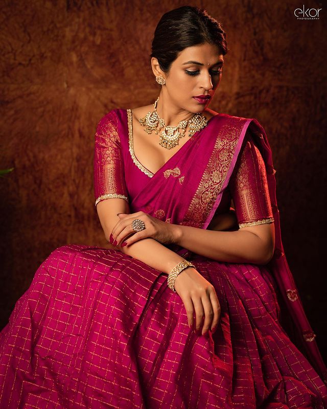 Ethereal Elegance: Shraddha Das' Magenta Half Saree Magic