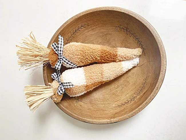 sherpa carrots in wooden bowl