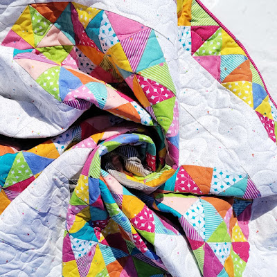 Flutterfly butterfly quilt made with Colour Wall fabric from Riley Blake Designs