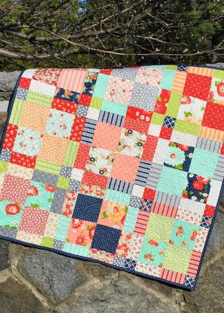 lap quilt made using layer cake fabric