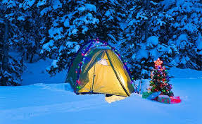 Tent in the snow with Christmas Tree