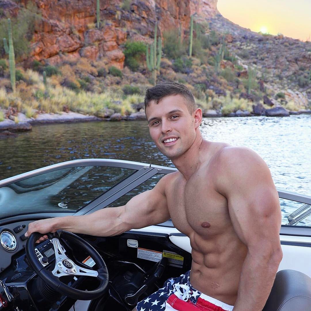 fit-shirtless-sexy-guy-smile-abs-boat-ride