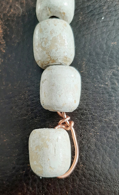 knot bead onto end of wire