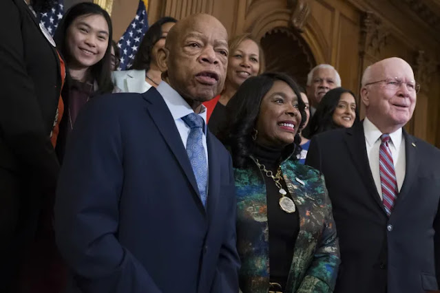 Civil rights leader Rep. John Lewis, D-Ga., Rep. Terri Sewell, D-Ala., and Sen. Patrick Leahy, D-Vt.