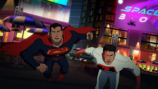 Image of Superman and Superboy fighting together