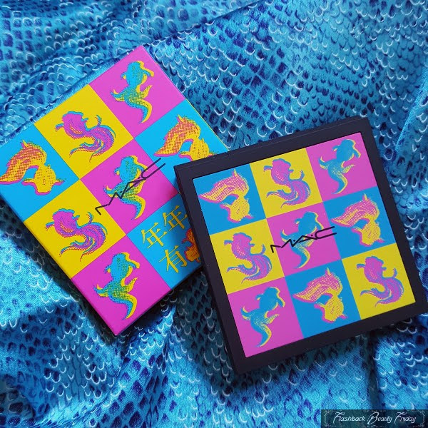square eyeshadow compact next to box both with brightly coloured pop art fish illustrations