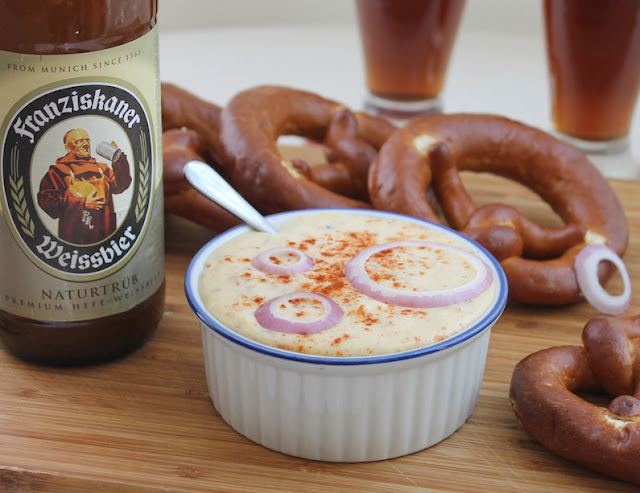 Food Lust People Love: Bavarian Cheese Spread, also known as obatzter, obazda, obazde, obazd'n and obatzda, is a strong cheese spread made with ripe Camembert, cream cheese, butter, onions, spices and, of course, beer. It’s a classic Bavarian beer garden recipe, best enjoyed with a cold stein of Weissbier or indeed, your own favorite brew.