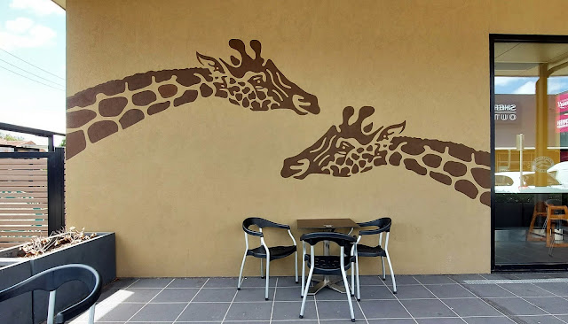 Bankstown giraffe Mural on Zarraffa's Coffee House