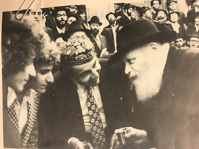 Baruch with the Rebbe between his father and brother