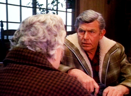 Sam McNeill (Andy Griffith) interviews a witness in Winter Kill, 1974