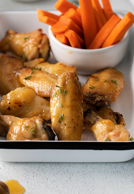 close up of wings in white tray.