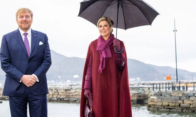 Queen Maxima wore Sirius wine-red coat by Claes Iversen. Crown Prince Haakon and Crown Princess Mette-Marit