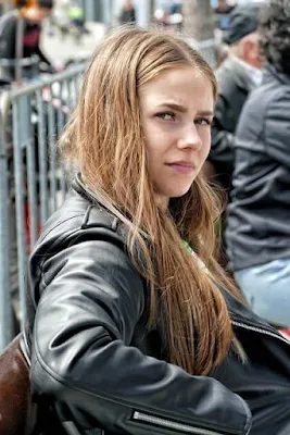 A Cute Girl Wearing Black Leather Jacket