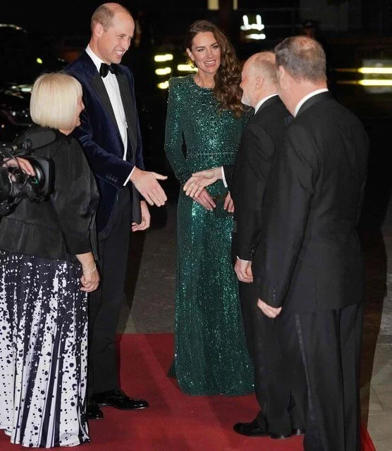 Kate Middleton wore a green gown by Jenny Packham. ​Emmy London pumps and Missoma London earrings