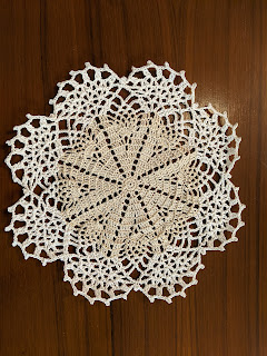 Full finished view of Sweet Nothings Crochet Peace Doily - a free crochet pattern